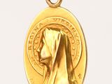 l'image d'une médaille d'or sur laquelle figure le visage d'une femme