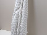 a towel hanging on a hook on a wall