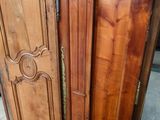 two wooden doors that are open on the floor