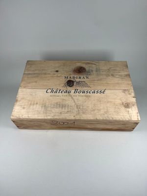a close up of a wooden box with a label on it