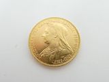 an image of a gold coin with a woman ' s face on it