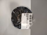 a roll of black tape wrapped in plastic on a white surface