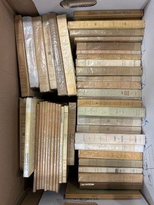 a box full of books sitting on the floor