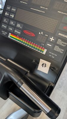 a close up view of a tread machine in a gym