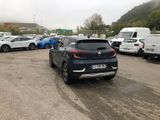 many cars parked in a parking lot in a parking lot
