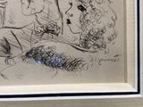 a drawing of a man and a woman sitting on a couch