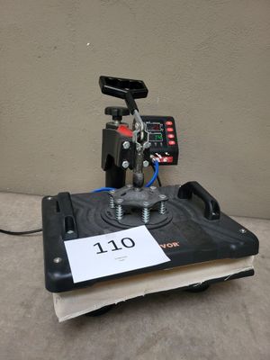 a close up of a machine on a table with a sign on it