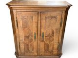a wooden cabinet with a marble top on a white background