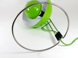 a green lamp that is connected to a wire