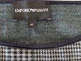 an image of a close up of a shirt with a label on it