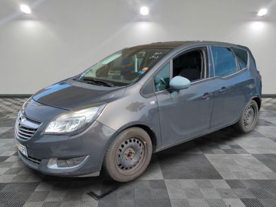 a picture of a grey car parked in a garage