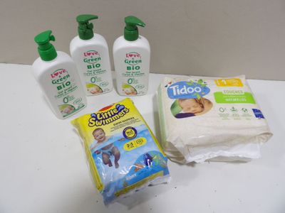 three bottles of soap, a bag of diapers, and a bag of wipes