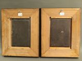 pair of antique wooden picture frames with glass inserts