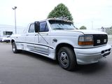 a white truck that is parked in a parking lot
