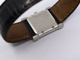 an image of a close up of a wrist watch on a white surface