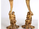 paire de bougeoirs en bronze doré ornés de chérubins et de chérubins
