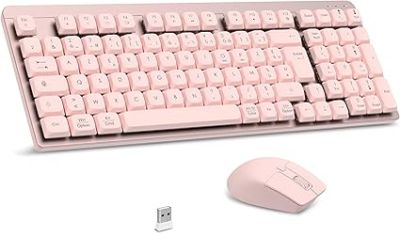 un clavier rose et une souris posés l'un à côté de l'autre
