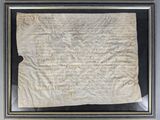 a piece of paper with writing on it in a frame