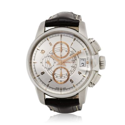 a close up of a watch on a white background
