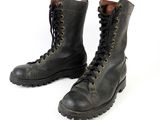 pair of black leather boots with laces on them on a white background