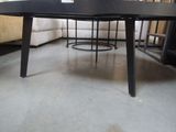 an image of a black table in a living room