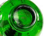 underside view of a green glass bottle on a white background