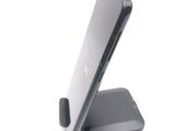 a close up of a cell phone on a stand