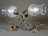 two lamps that are sitting on a table