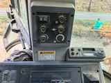 a control panel on the back of a tractor