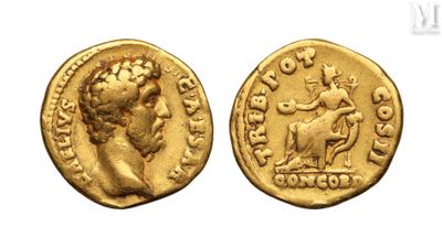 a gold coin with an image of a woman on it