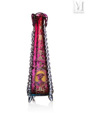 purple glass vase with a gold and pink design on the bottom