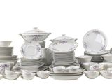 a lot of white and purple plates and bowls