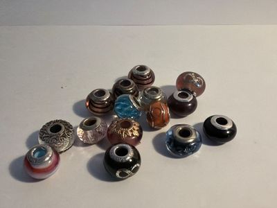 a lot of beads that are sitting on a table