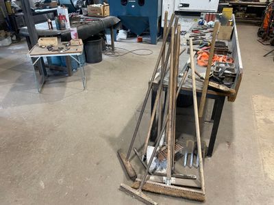 a room with a lot of tools on the floor