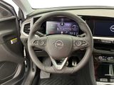 the interior of a car with a steering wheel, dashboard, and dash board