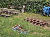 a lot of tools that are laying out in the grass