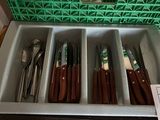 many utensils in the trays in the kitchen