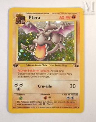 the pokemon card has a picture of a dragon on it ' s back