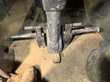 a close up view of a machine that is working on a piece of metal