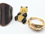two rings and a ring with a picture of a teddy bear on it