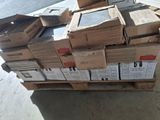 a pile of boxes on top of a pallet