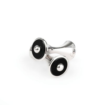 pair of black and silver cufflinks on a white background