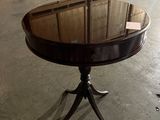 an image of a round table with a glass top
