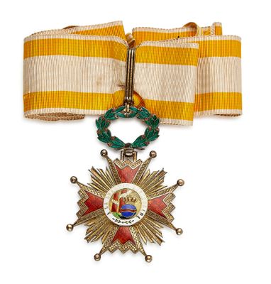 une image d'une médaille entourée d'un ruban sur fond blanc