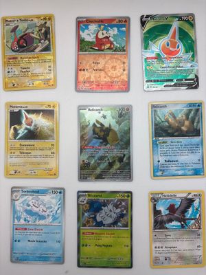 beaucoup de cartes pokemon sur le mur