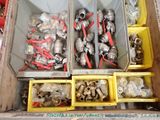 many different types of pipes and fittings in a box