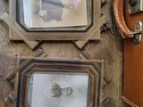 three pictures hanging on the wall next to an old suitcase