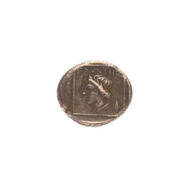 une image représentant une pièce de monnaie sur laquelle figure une femme