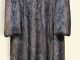 an image of a fur coat hanging on a wall