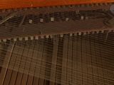 a close up of a piano that is being played by someone